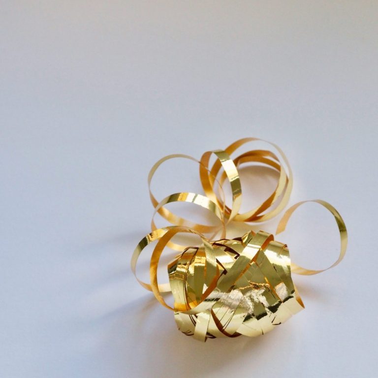 Gold curling ribbon available from our online shop at The Velvet Ribbon Wrapping Company Gold curling ribbon available from our online shop at The Velvet Ribbon Wrapping Company