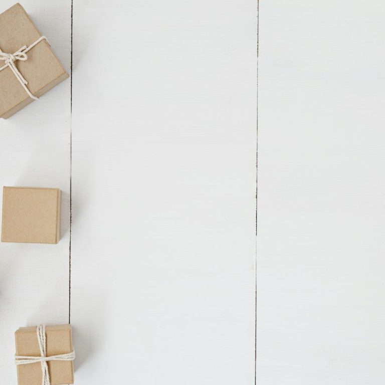 Cardboard boxes and string invoking themes of nature and being kind to the environment and using recyclable materials.